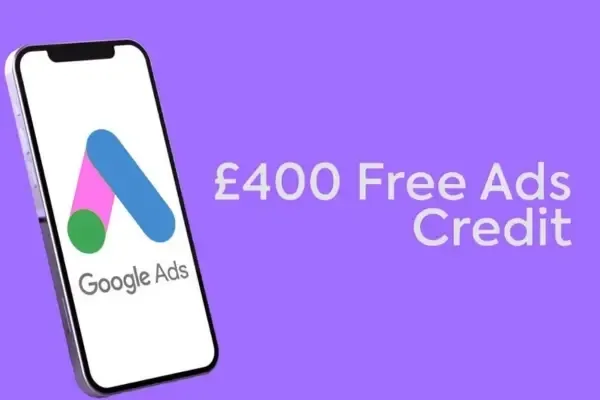 Phone displaying the Google Ads logo with the words "£400 free ads credit" next to the iPhone on FUZE Agency puple background